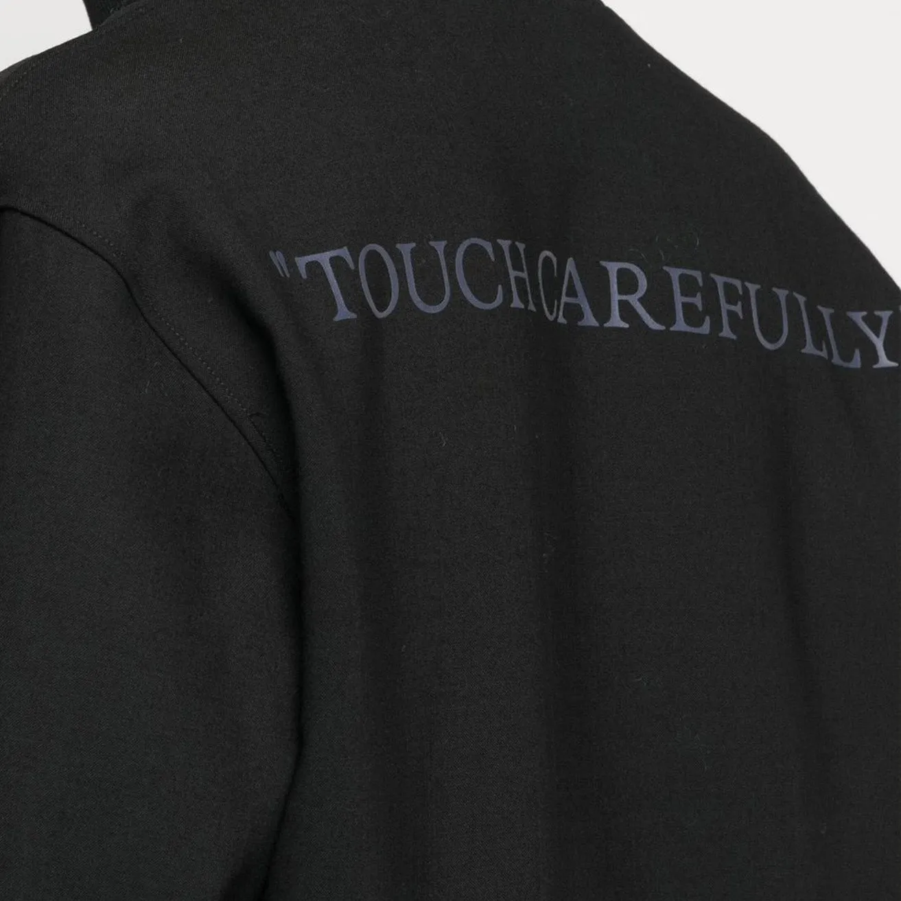 OFF-WHITE Quote Wool Slim Tracktop in Black
